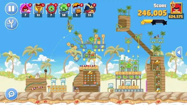Angry Birds Friends screenshot: a slingshot aimed at a wooden tower level